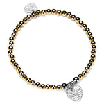 Gold beaded stacking bracelet with sterling silver angel wings heart charm